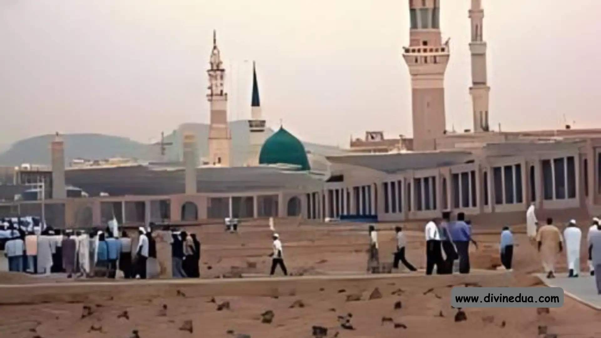 A panoramic view of Jannat al-Baqi cemetery with the Green Dome of Masjid an-Nabawi in the background.