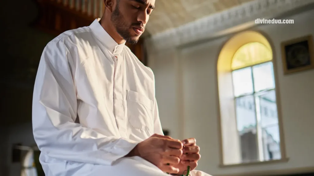 A serene person sitting by a window finding peace through Dua for anxiety and stress and spiritual Sakinah.