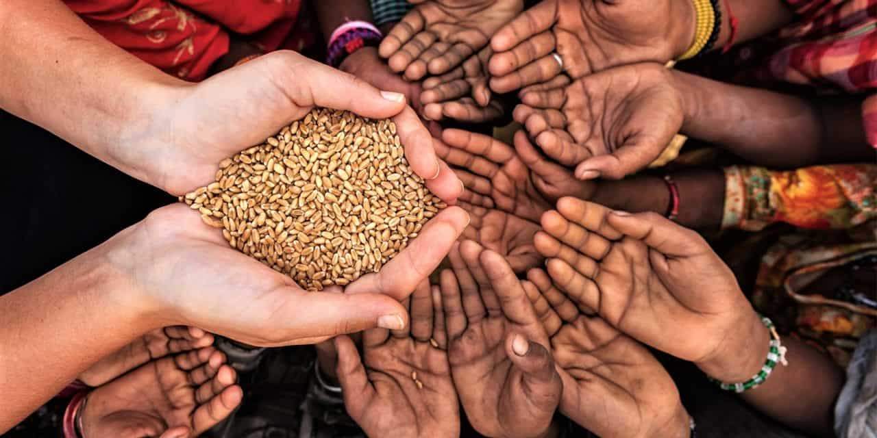 Someone giving charity during Ramadan