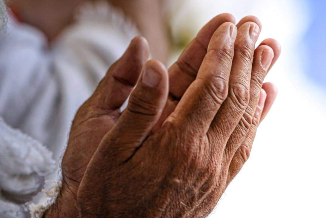Hands raised in supplication, seeking Allah’s help